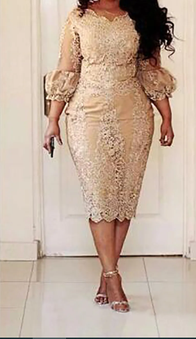 An image of a Tea-Length champagne mother-of-the-bride dress